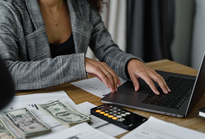 Person at desk going over personal finances